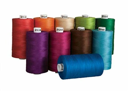 Assorted colorful thread spools arranged in rows.