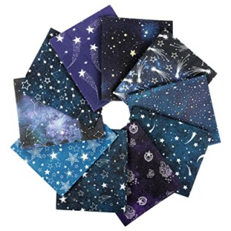 Assorted star-patterned fabric squares arranged in a circle